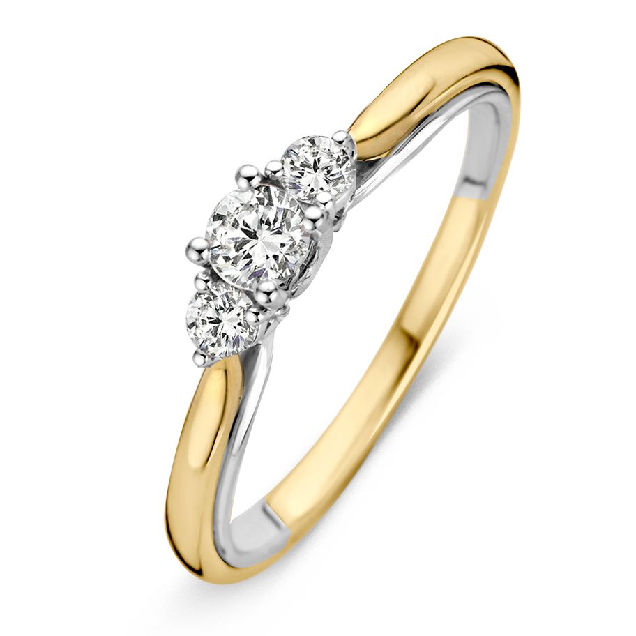 Bicolor geel- en witgouden ring met drie briljant diamanten in een golvende setting.