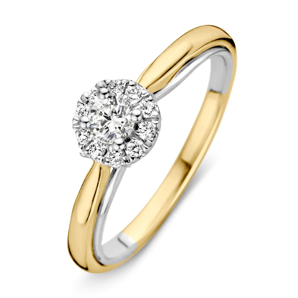 Anello bicolore con diamanti e brillantezza di 0,33 ct.
