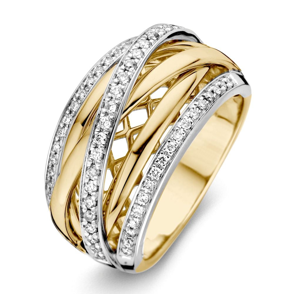 Anello bicolore audace in oro con accentuazione di diamanti brillanti da 0,34 crt.
