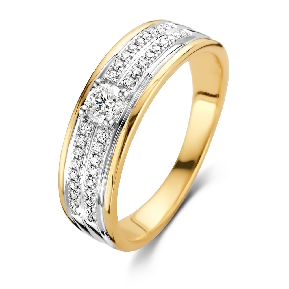 Anello bicolore elegante in oro con centro in diamante brillante da 0,34 ct.