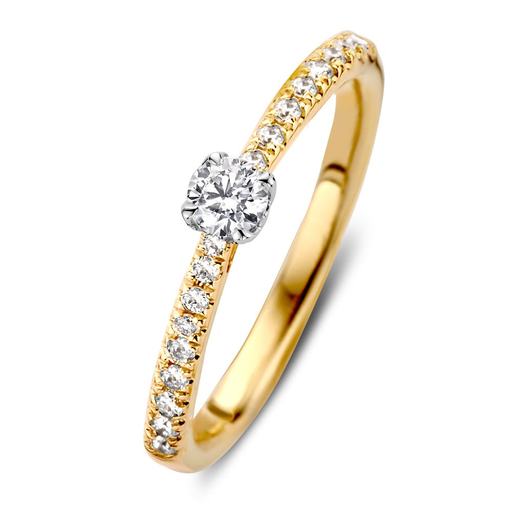 Anello solitario bicolore con diamante taglio brillante di 0,35 crt, finitura dorata e argentata.