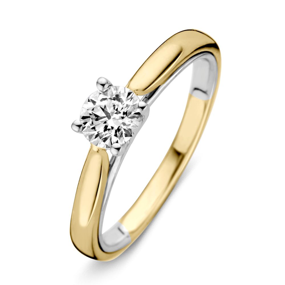 Anello bicolore in oro giallo e bianco con brillante (0,40 ct).