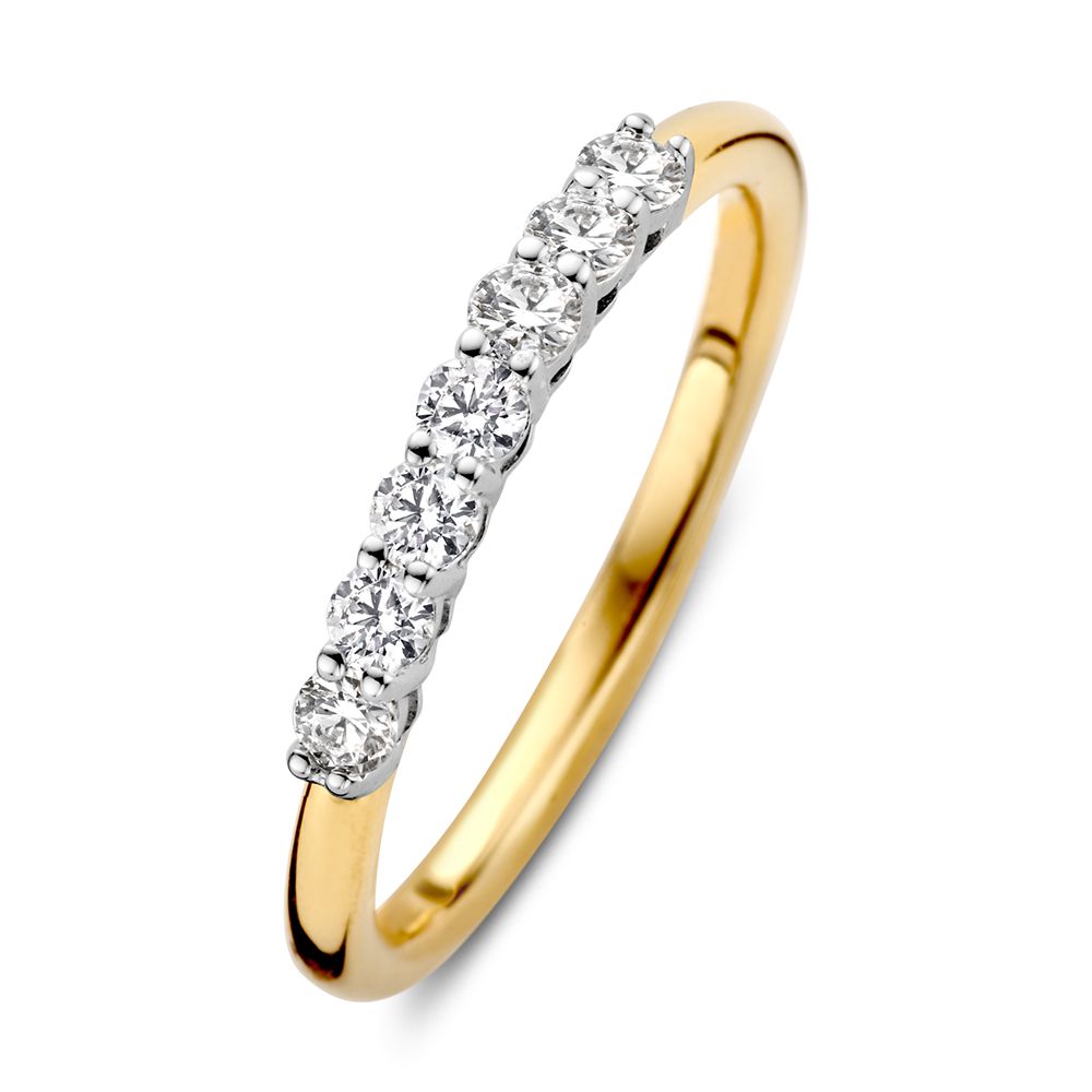 Anello bicolore in oro giallo e bianco con diamanti (0,40 ct) e finitura lucida.