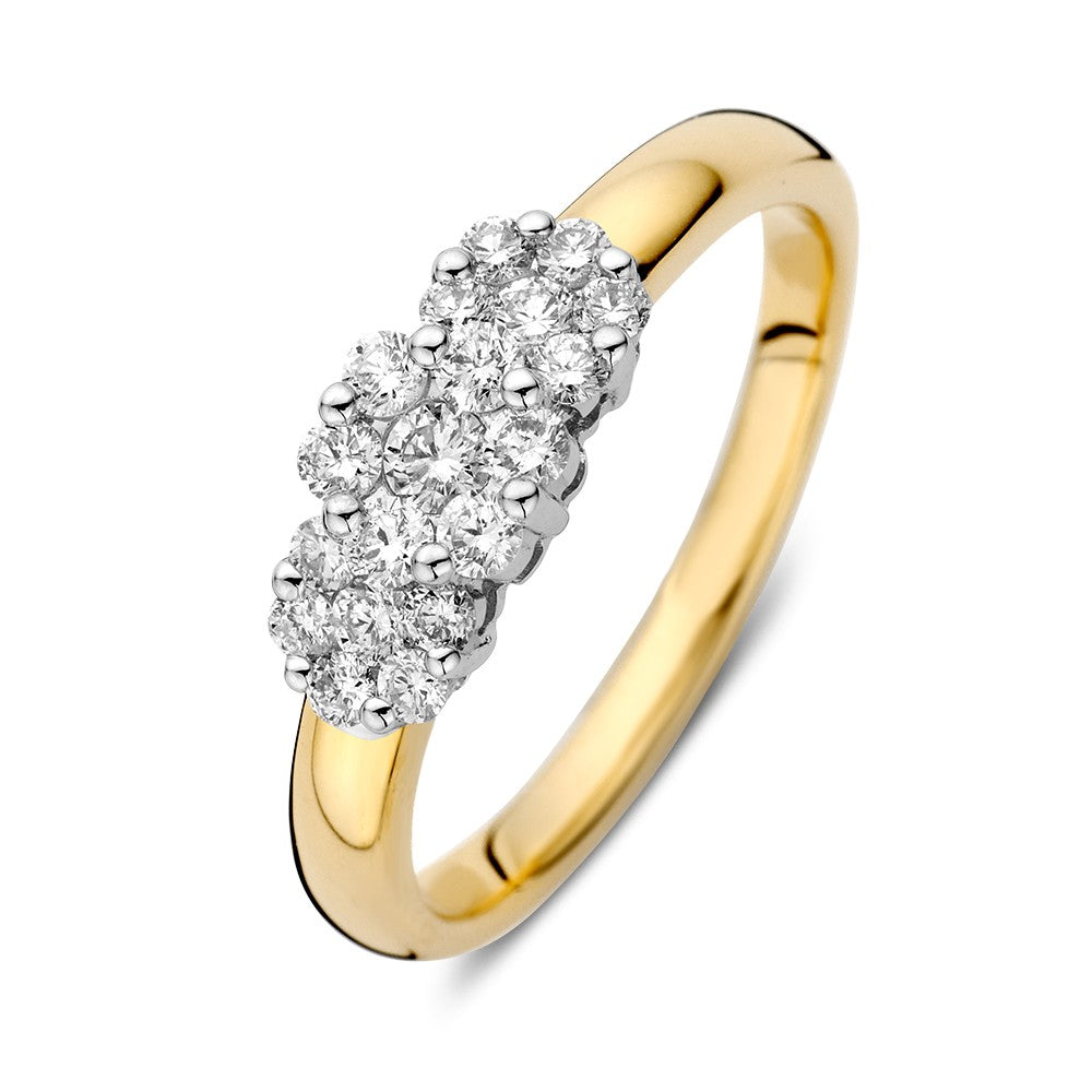 Anello bicolore con brillanti da 0,52 carati, con parte centrale in oro bianco e fascia in oro giallo.