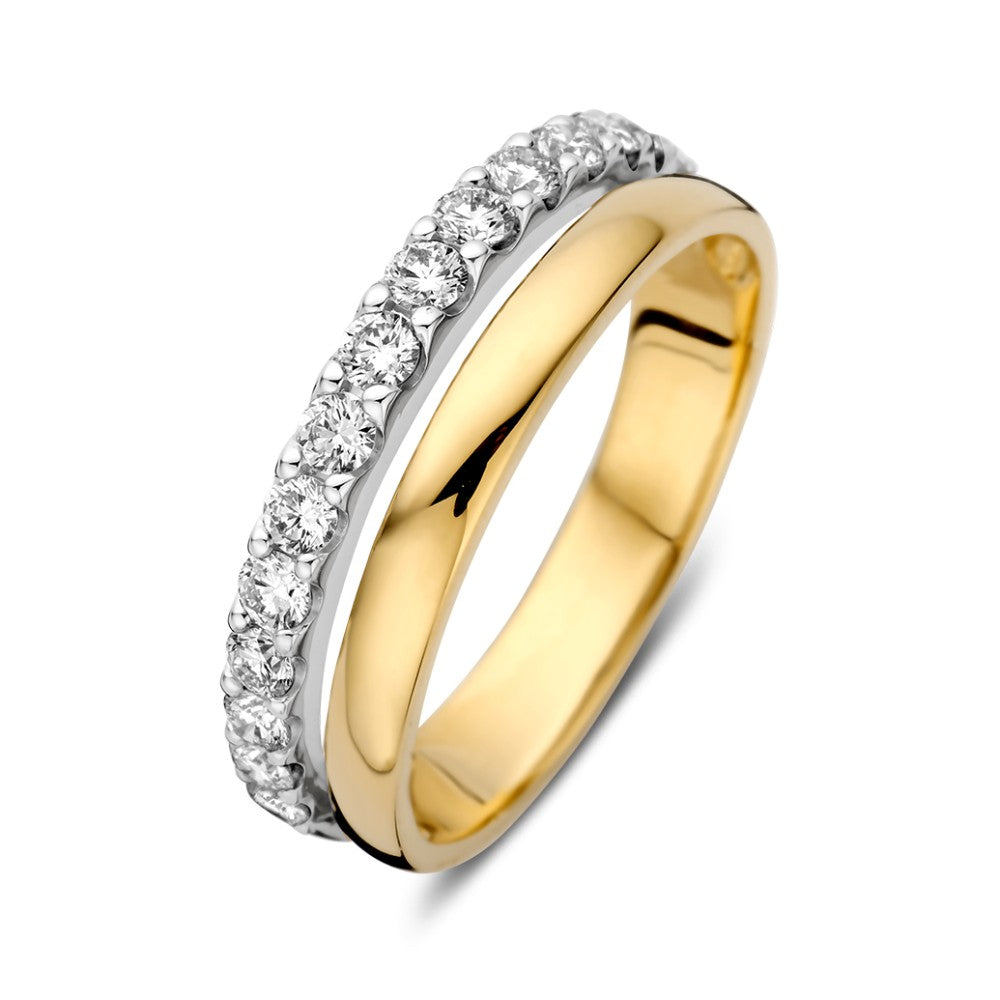 Anello bicolore con brillanti da 0,58 ct, con una parte in oro giallo e una in oro bianco.