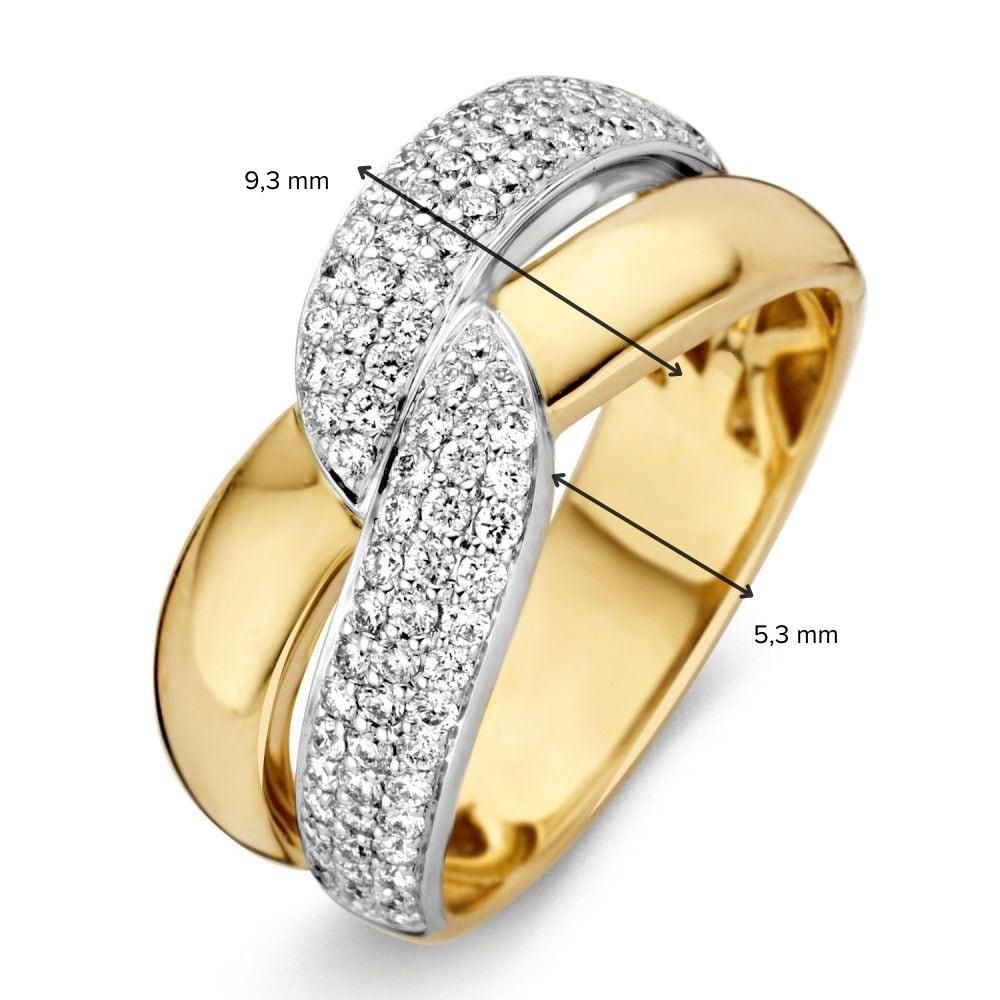 Anello bicolore in oro giallo e bianco con diamante taglio brillante 0,61ct