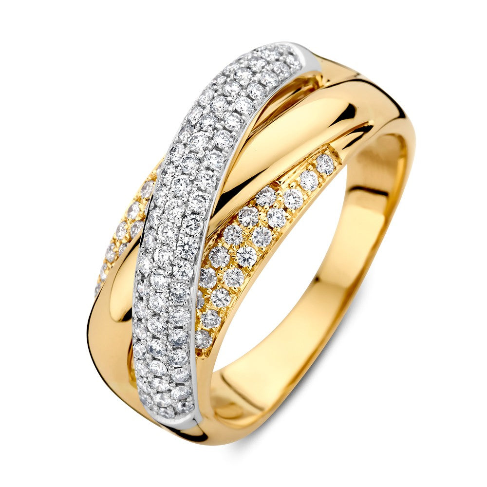 Anello bicolore in oro bianco e giallo con diamanti pavé.