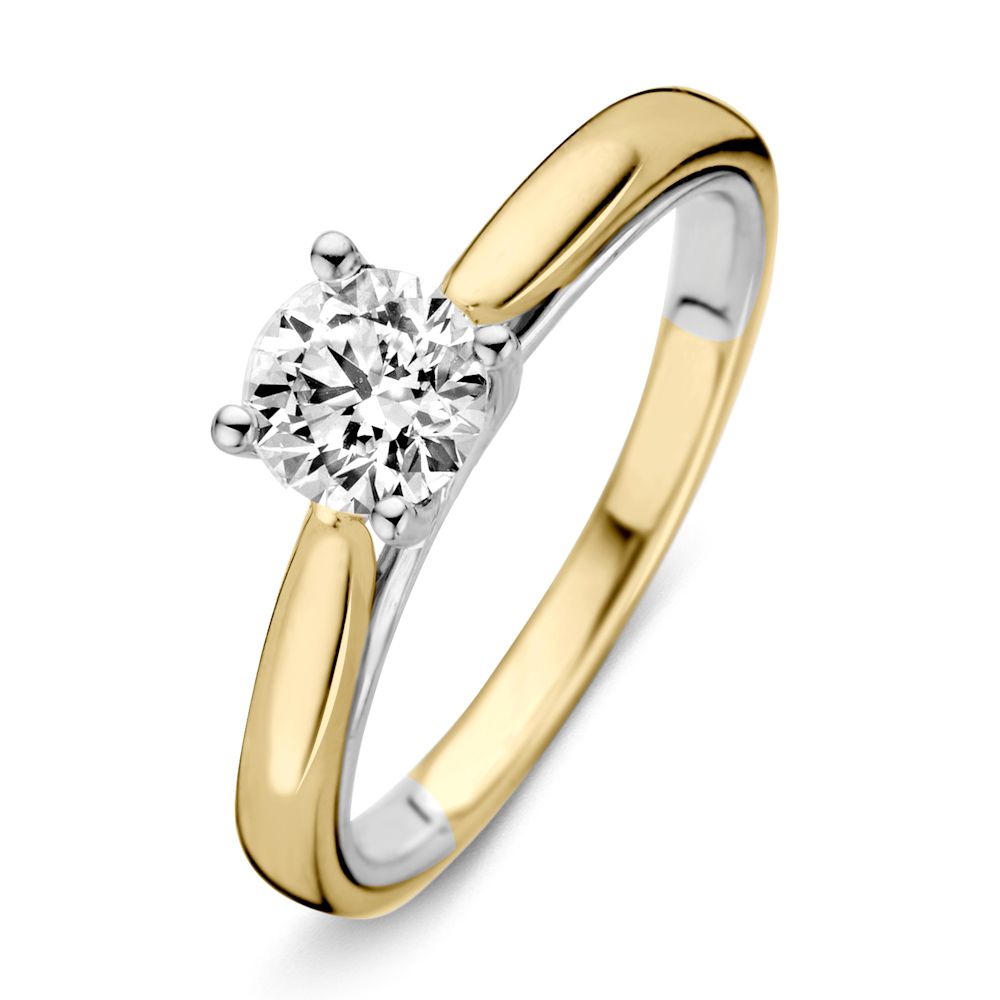 Anello bicolore in oro giallo e bianco con diamante brillante 0,74 ct H/SI-1, 14 carati.