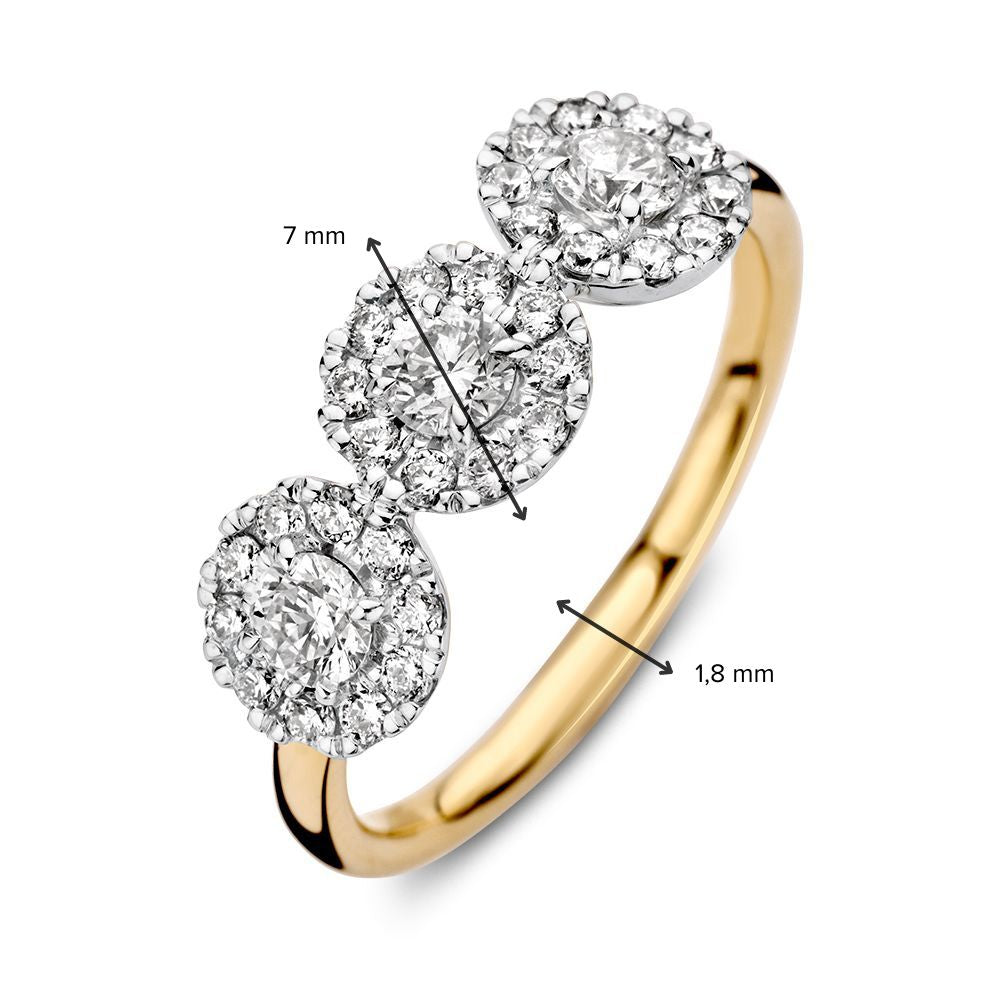 Anello bicolore tre pietre in oro con diamanti 0.81ct H/SI-1 14 carati