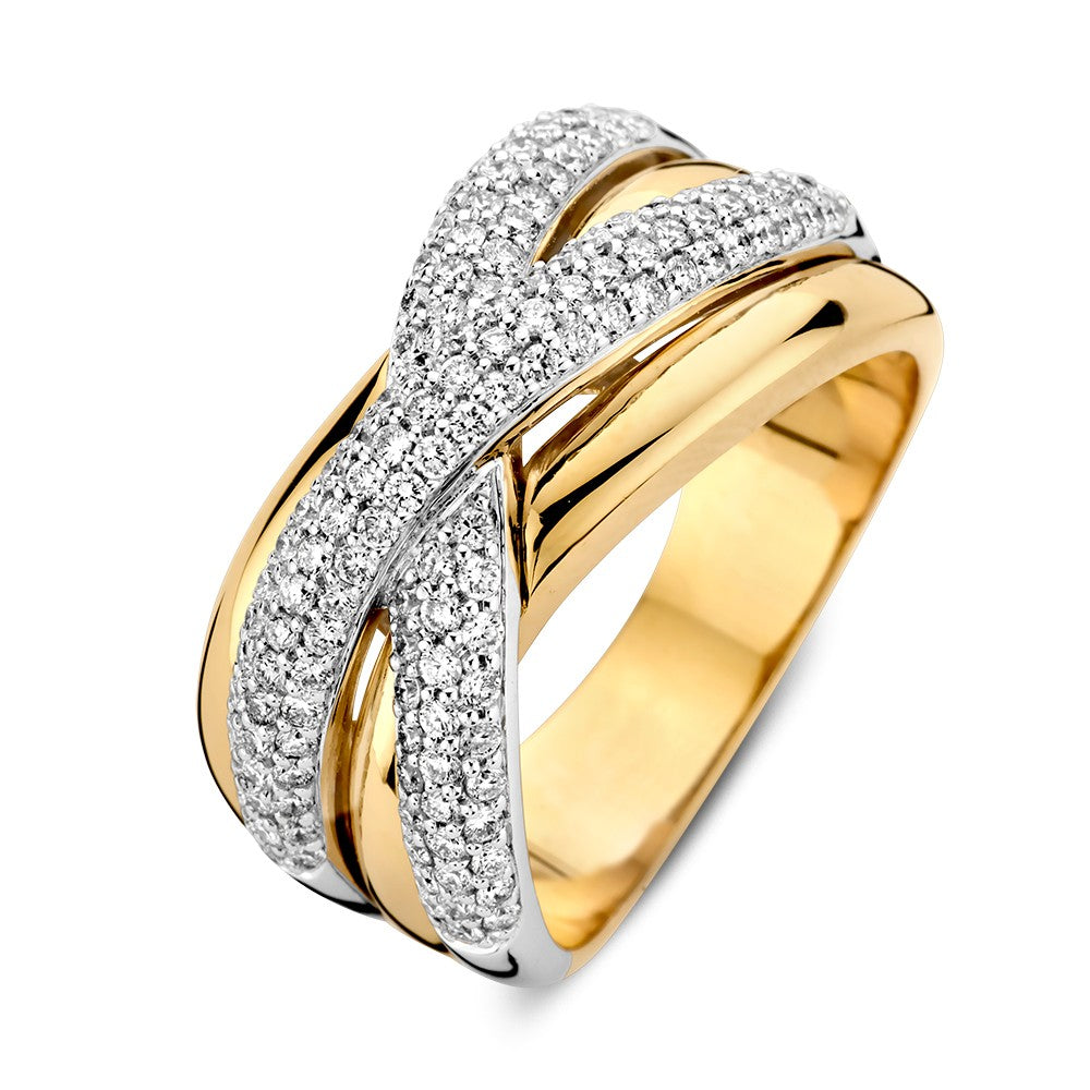 Anello bicolore in oro bianco e giallo con diamanti in bande incrociate.
