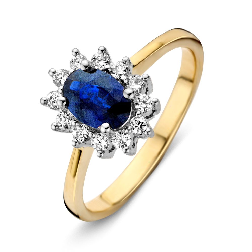 Anello in oro giallo 14 carati con zaffiro blu ovale e diamanti circondanti.