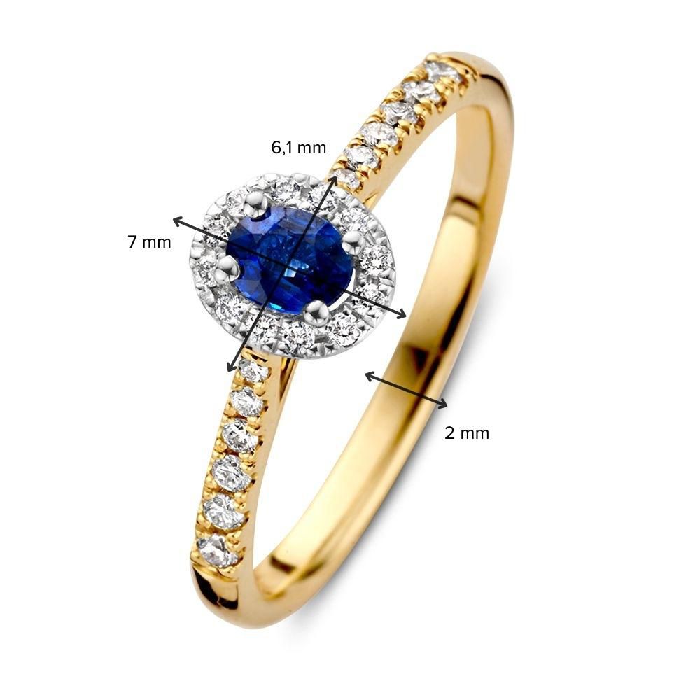 Anello da donna in oro bicolore 14 carati con zaffiro ovale blu e halo di diamanti