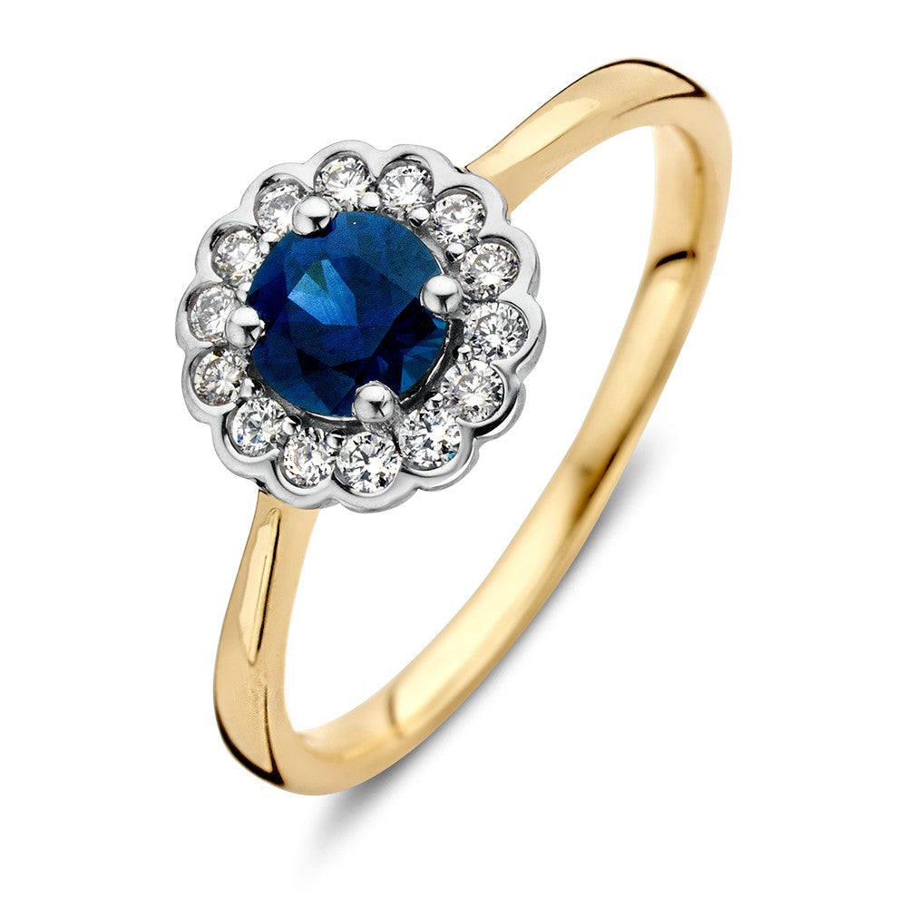 Anello in oro classico con zaffiro blu rotondo e diamanti da 0,18 ct.
