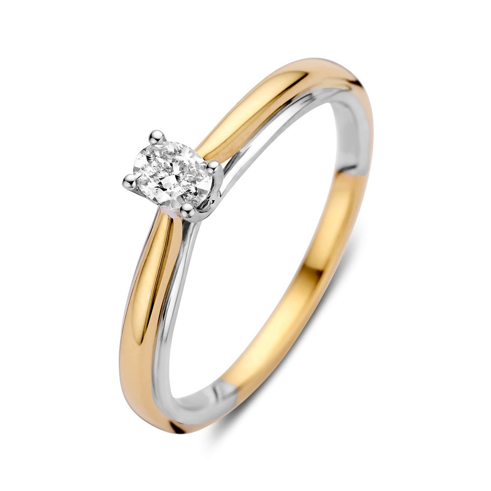Anello solitario bicolore in oro 14k con diamante ovale da 0,19 ct.