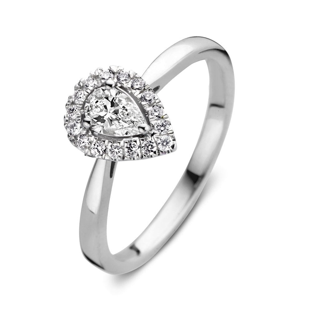 Anello in oro bianco con diamante a forma di goccia e pietre brillanti.