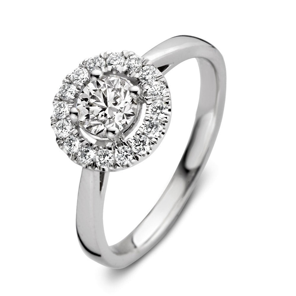Anello in oro bianco con diamante centrale circondato da una corona di diamanti.