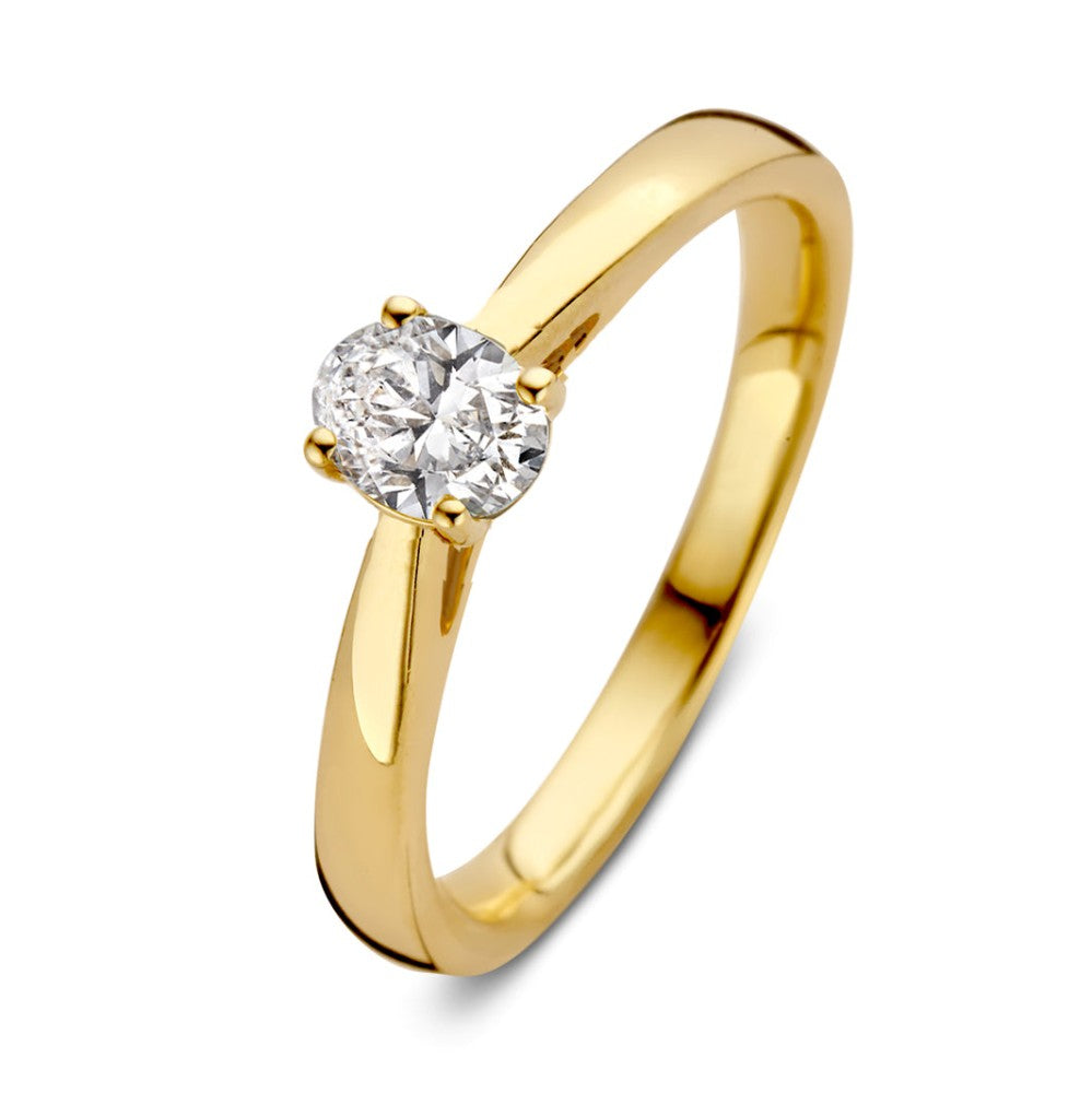 Anello in oro giallo con diamante centrale di 0,30 crt. e finitura lucida.