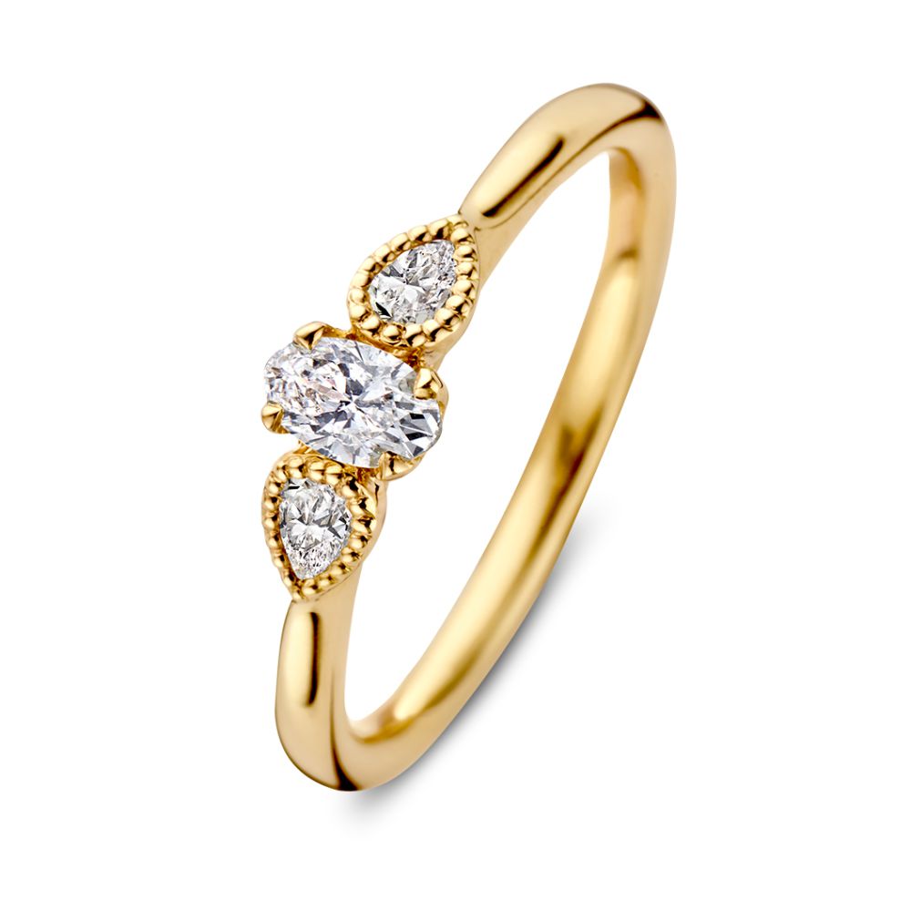Anello in oro giallo con diamante ovale e due pietre a goccia, 14 carati, 0,35 ct.