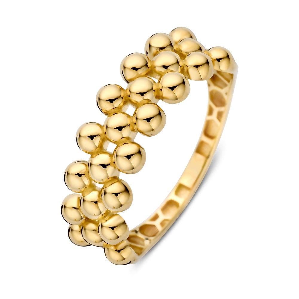 Anello in oro giallo con sfere lucide e finitura liscia.