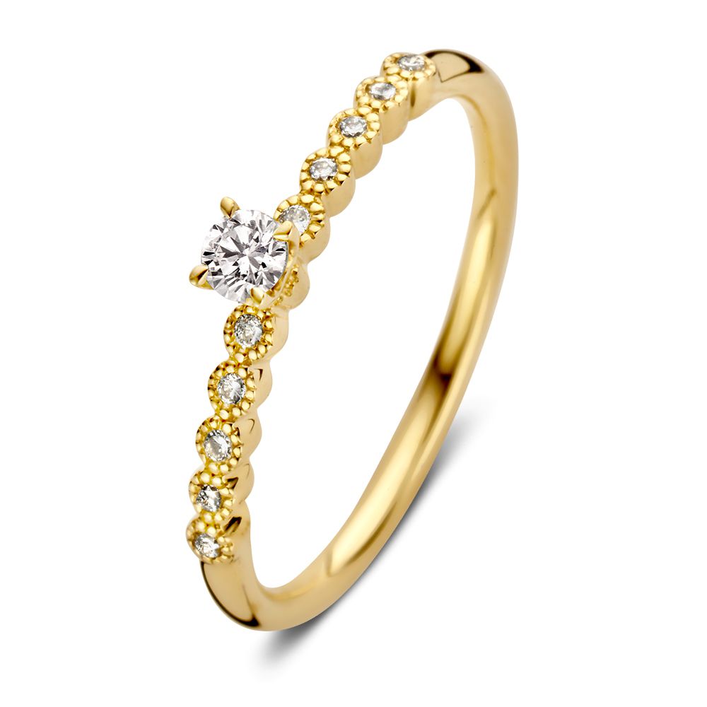Anello solitario in oro giallo con diamante centrale e pietre laterali, 14 carati, 0,19 ct.