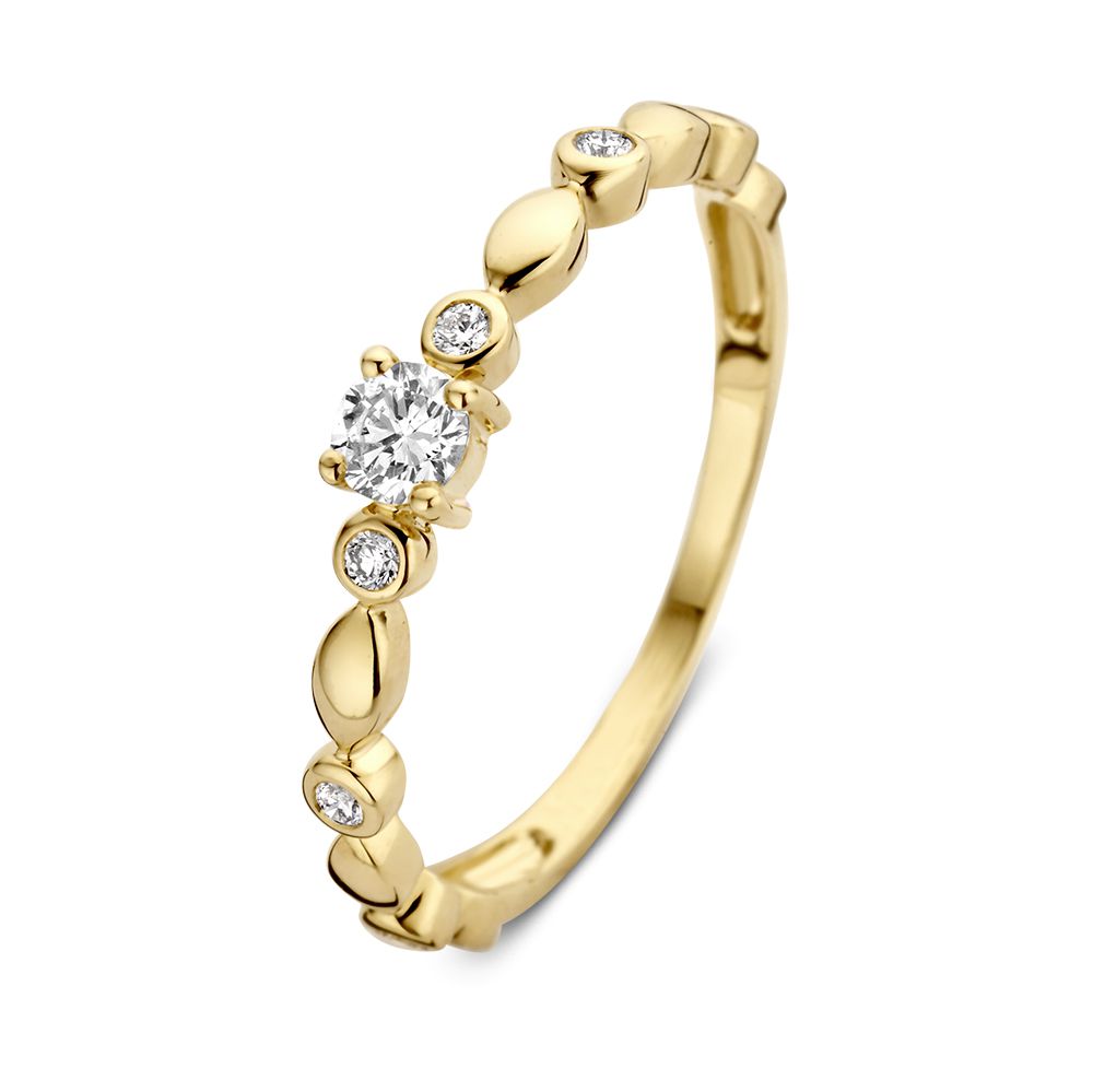 Anello solitario in oro giallo con diamante centrale da 0,23 crt e dettagli lavorati.