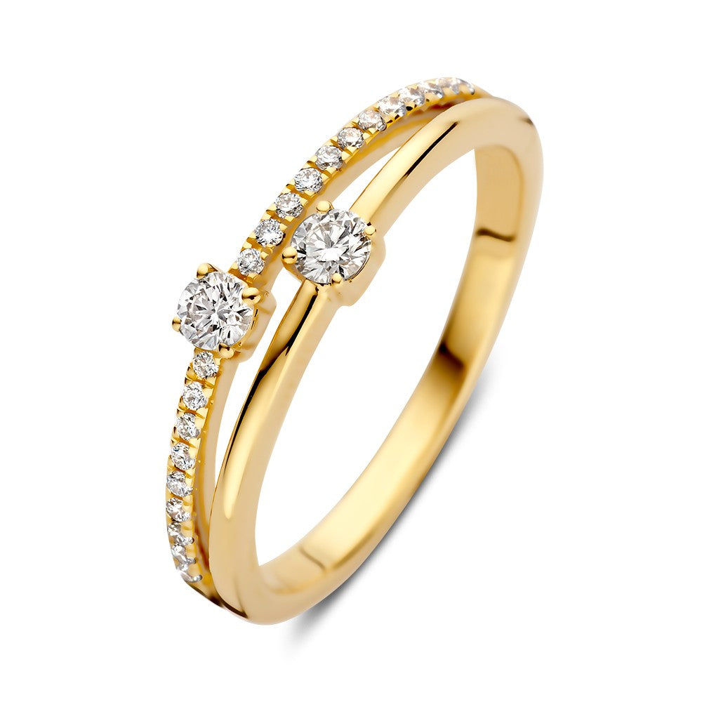 Anello in oro giallo con brillanti da 0,28 ct, caratterizzato da due pietre centrali e una fila di diamanti.