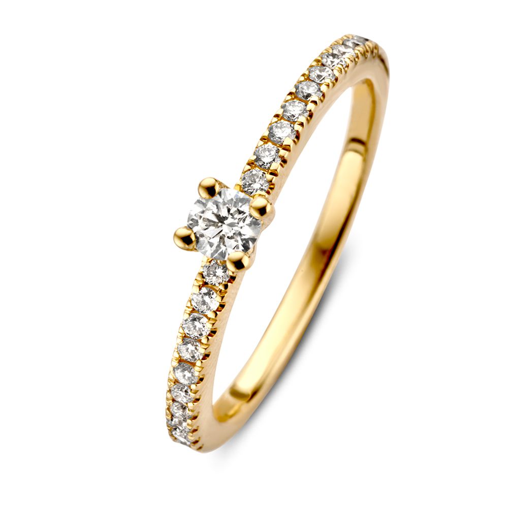 Anello solitario in oro giallo 14 carati con diamante centrale da 0,32 ct e pietre laterali.