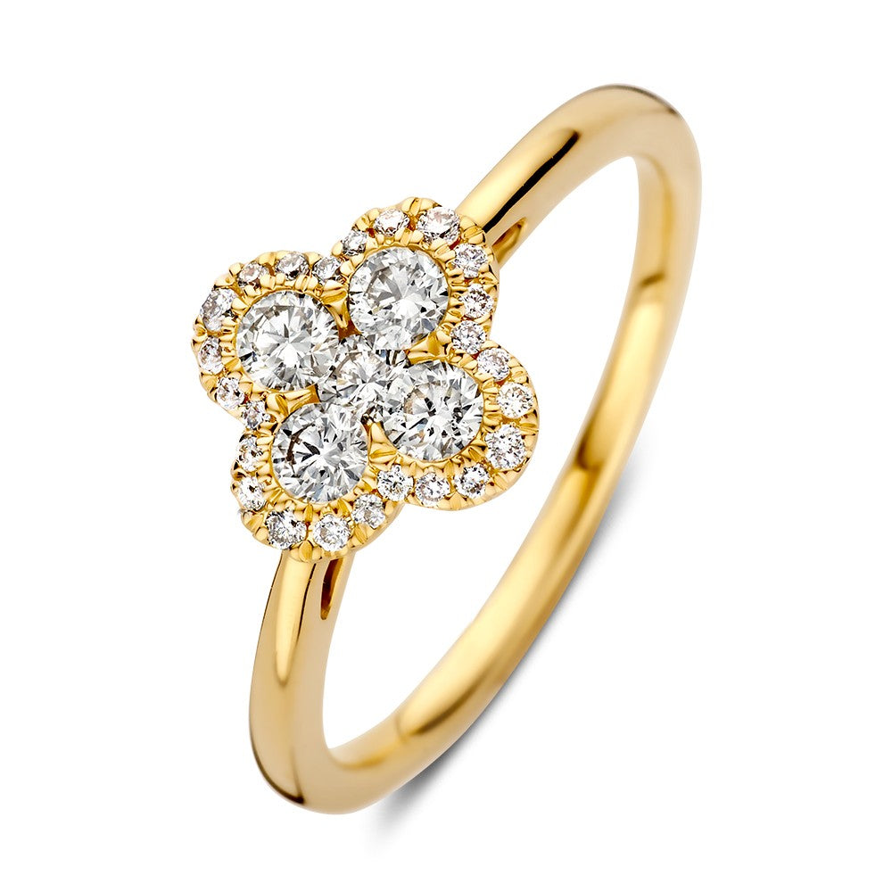 Anello in oro giallo con brillante di 0,48 carati e dettagli a forma di fiore.