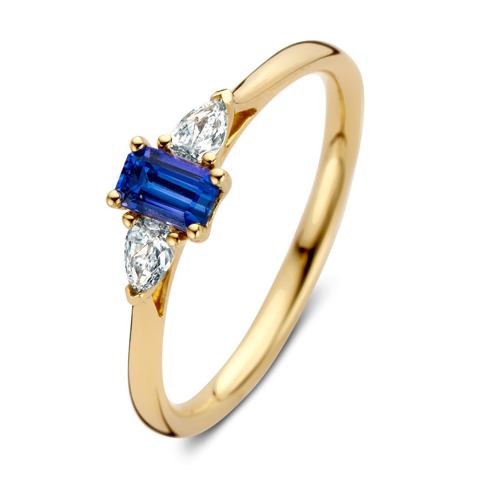 Anello in oro giallo con zaffiro taglio smeraldo e diamanti taglio pera.