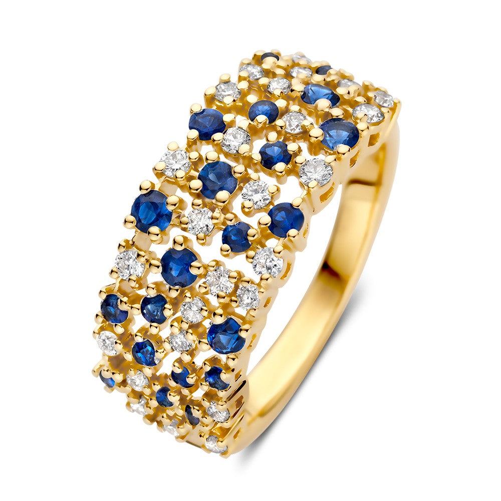 Anello in oro giallo con brillanti e zaffiri blu, design moderno e brillante.