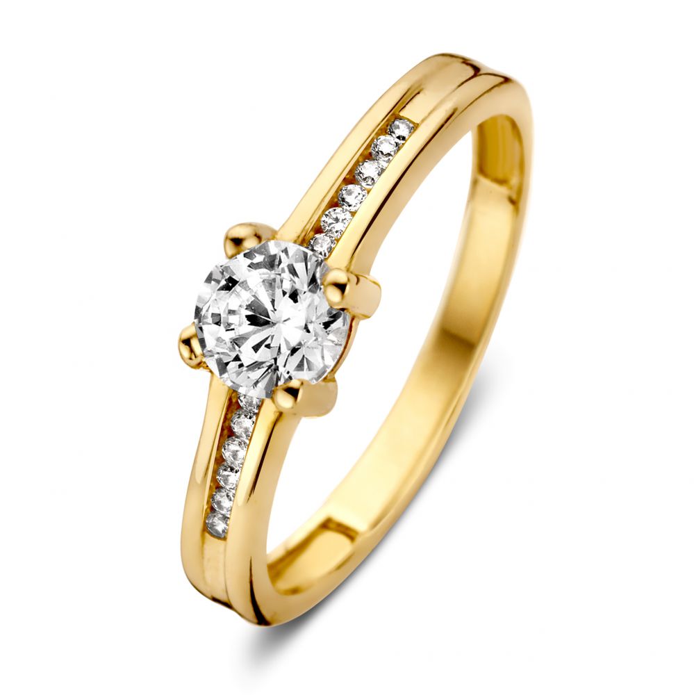 Anello da donna in oro giallo 14 carati con zirconia, design raffinato e brillantezza.