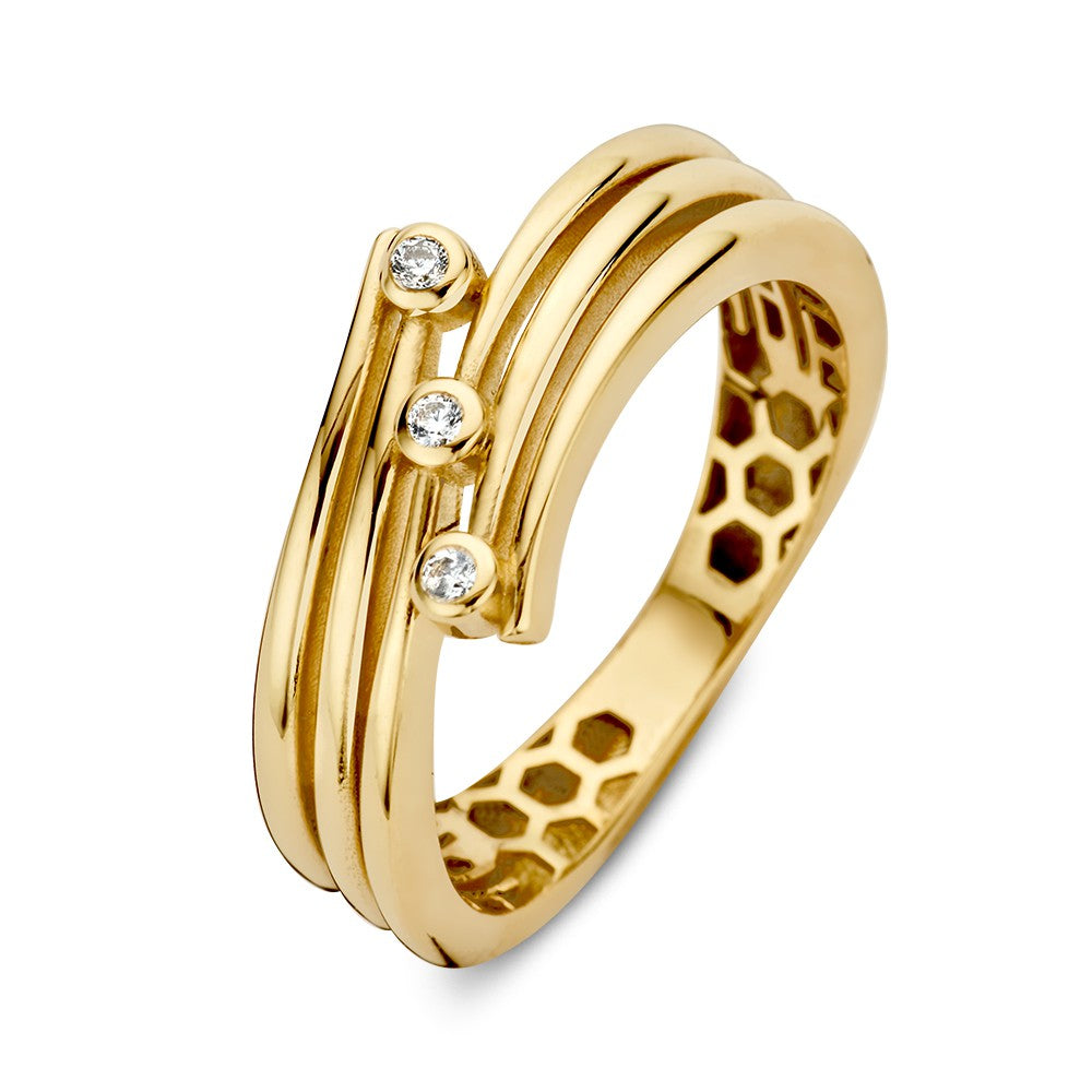 Anello in oro giallo elegante con zircone, design moderno e giocoso, con tre gemme.