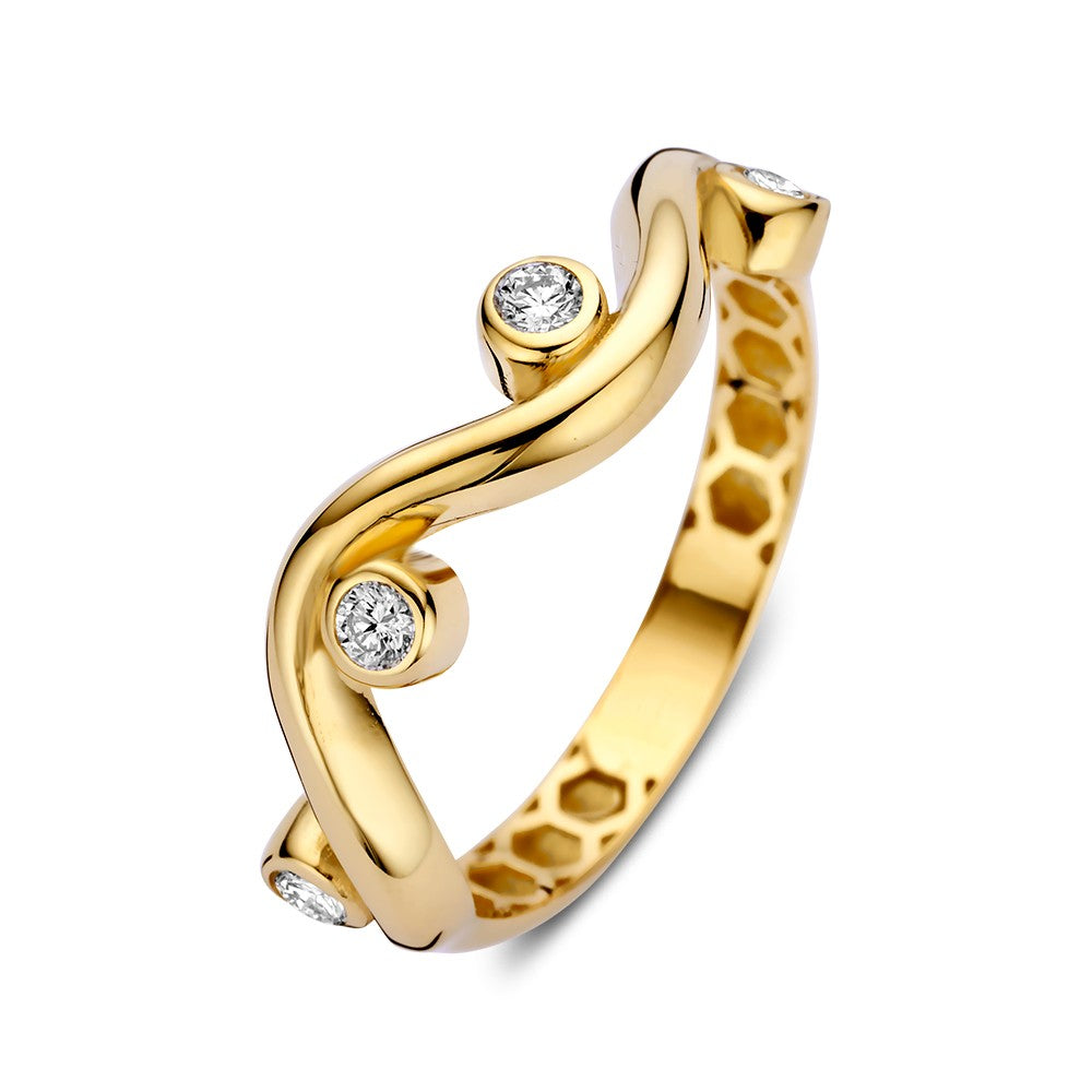Anello in oro giallo con zircone, design ondulato e incastonature rotonde.