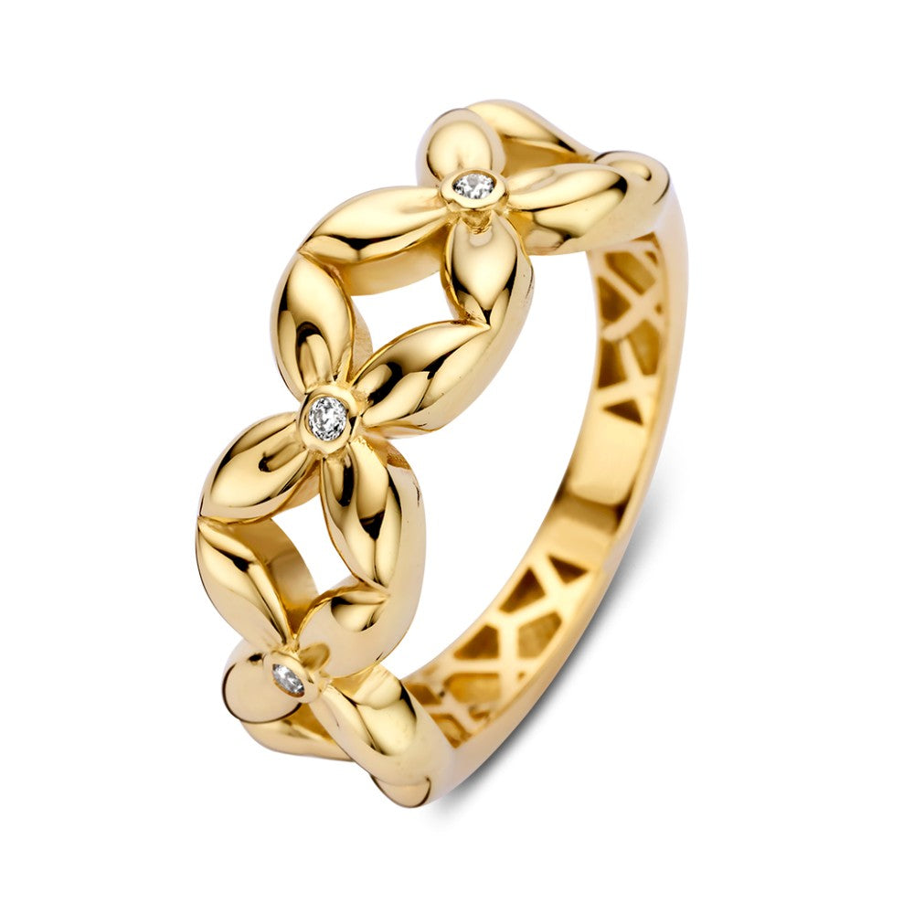 Anello in oro giallo con design floreale e cuori in zirconia, finitura lucida.