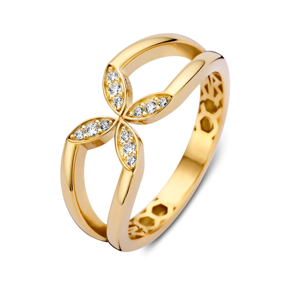 Anello in oro giallo con design floreale e zircone, caratterizzato da dettagli eleganti.