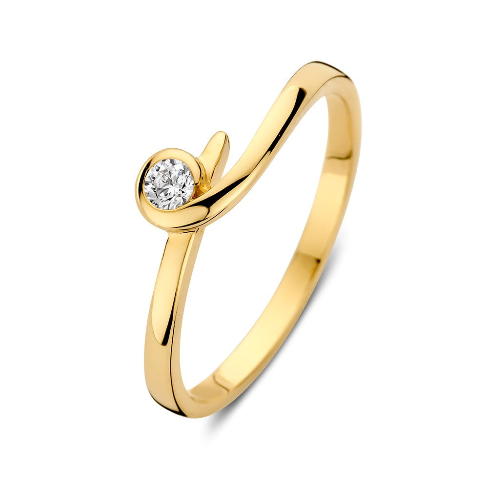 Anello in oro giallo con zirconia, design elegante e sinuoso, finitura lucida.