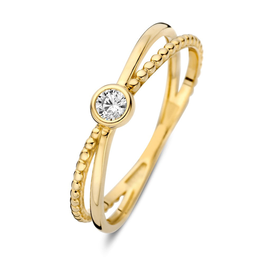 Anello in oro giallo con zircone centrale e dettagli a corda.