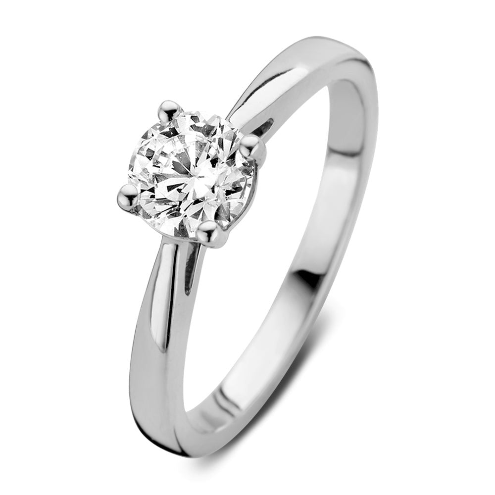 Anello in oro bianco con diamante centrale di 0,75 carati, design semplice e brillante.