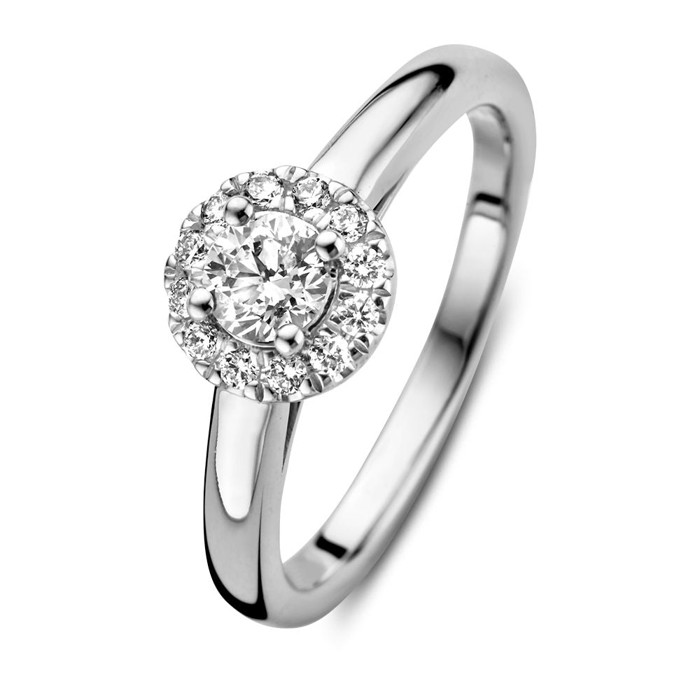 Anello in oro bianco elegante con diamante centrale da 0,40 carati e corona di diamanti.
