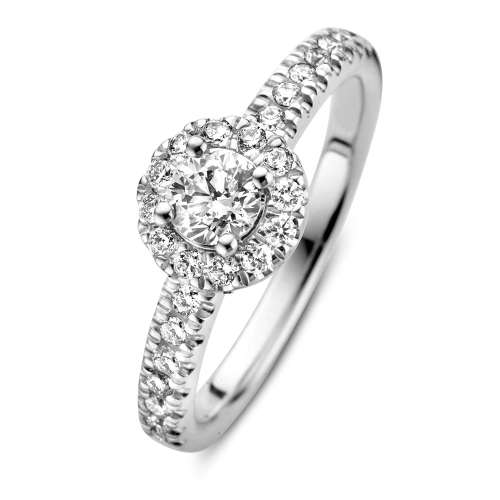 Anello in oro bianco con diamante centrale da 0,40 carati e accentuazione di brillanti.