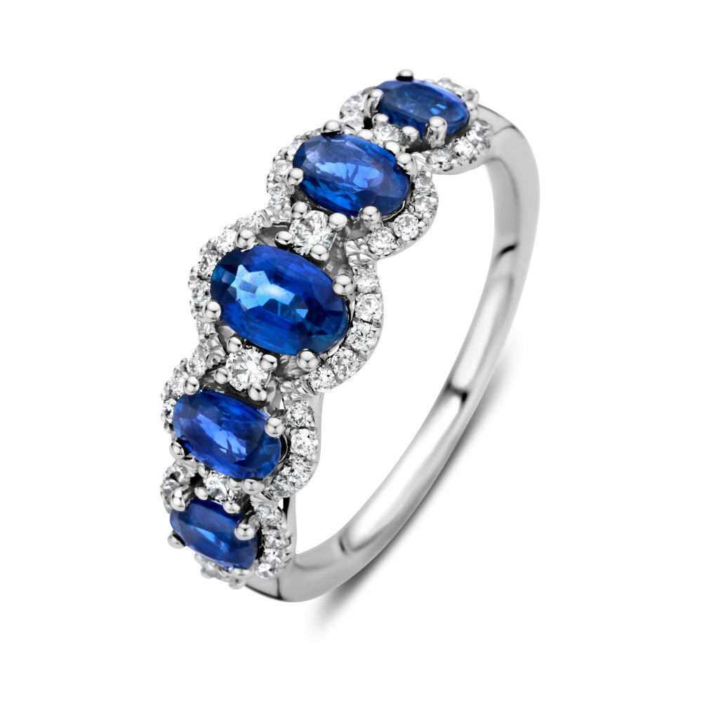 Anello di lusso in oro bianco 14 carati con zaffiri blu ovali e diamanti da 0,32 carati.