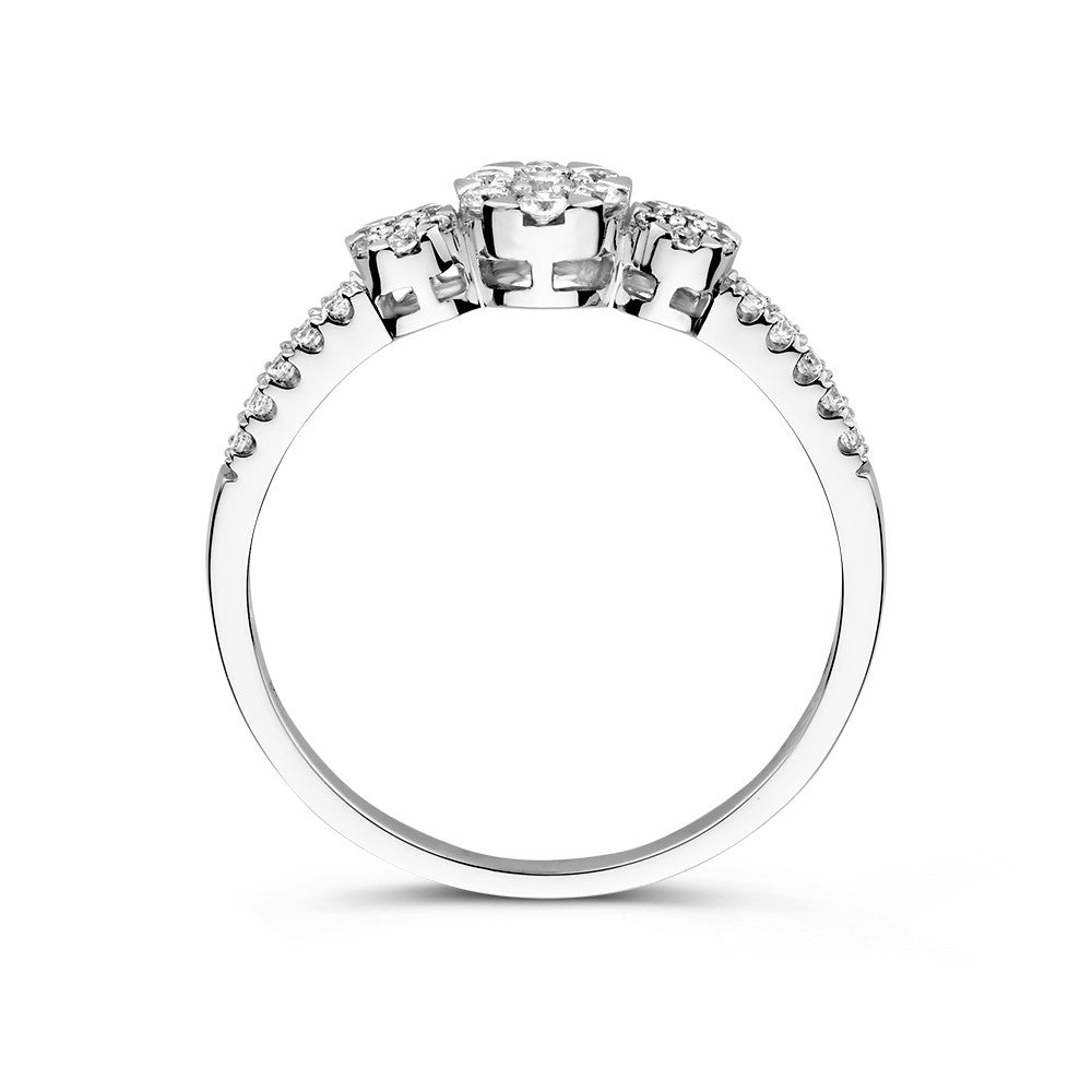 Anello a tre pietre in oro bianco con zircone e pietre laterali