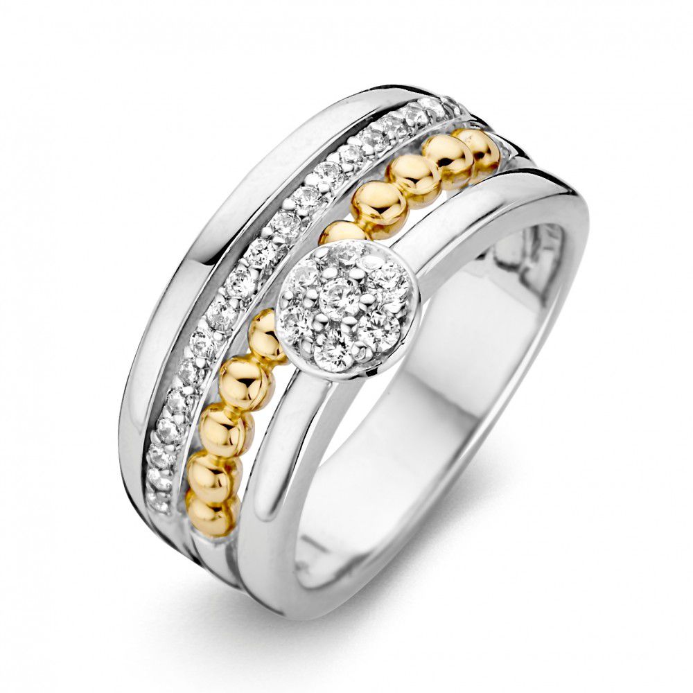 Anello in argento e oro con zircone, decorato con sfere dorate e dettagli brillanti.