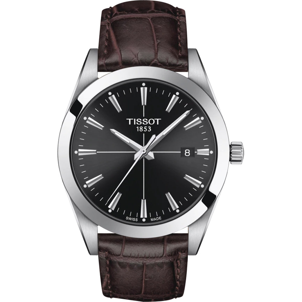 Orologio Tissot con cassa in acciaio, quadrante nero e cinturino in pelle marrone.