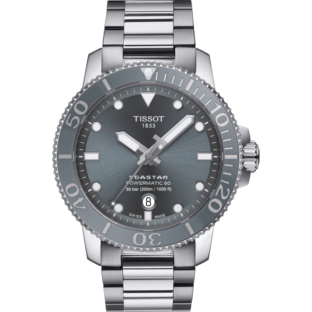 Orologio Tissot Seastar 1000 con cassa in acciaio inox, quadrante grigio, lunetta girevole e cinturino in maglia rolò.