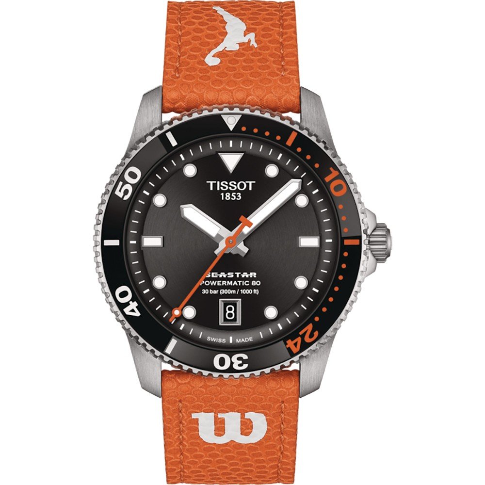 Orologio Tissot Seastar con cassa in acciaio inox, quadrante nero, cinturino in pelle arancione e dettagli bianchi.
