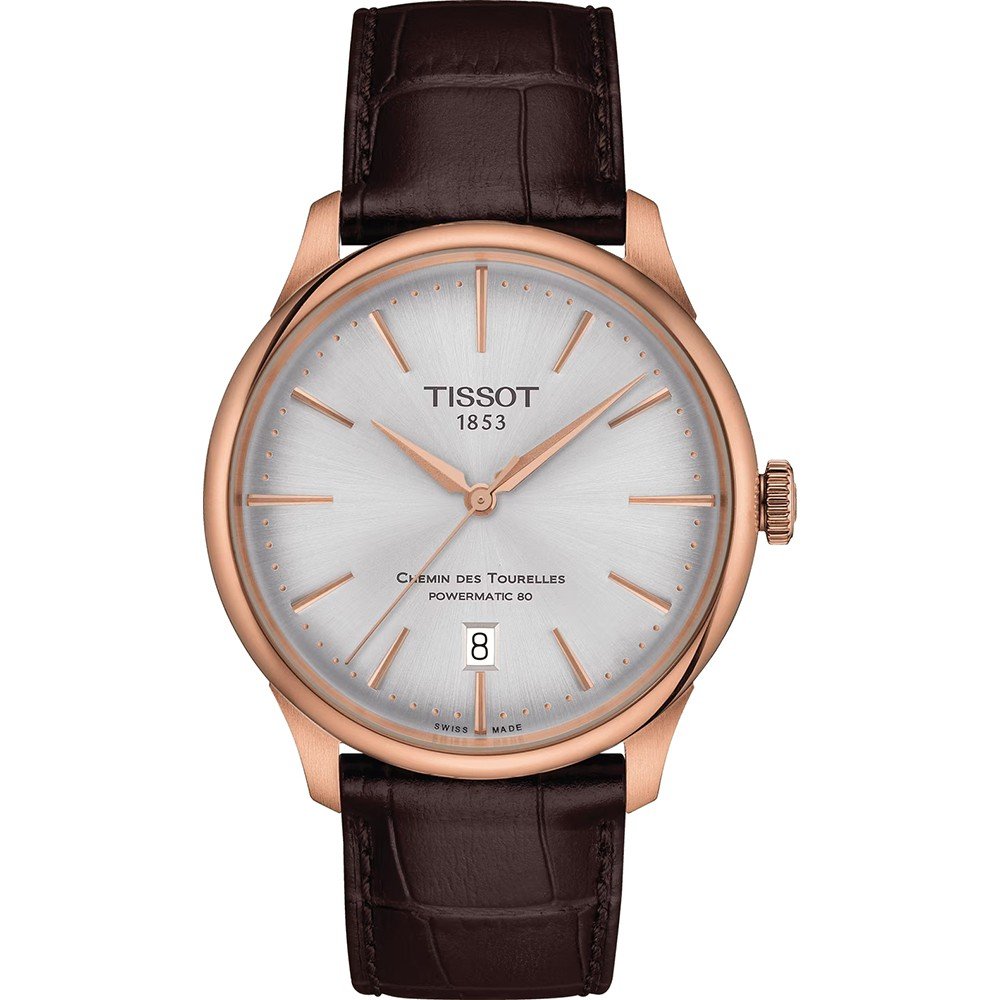 Orologio Tissot Chemin des Tourelles con cassa rosegold, quadrante argentato e cinturino in pelle marrone.