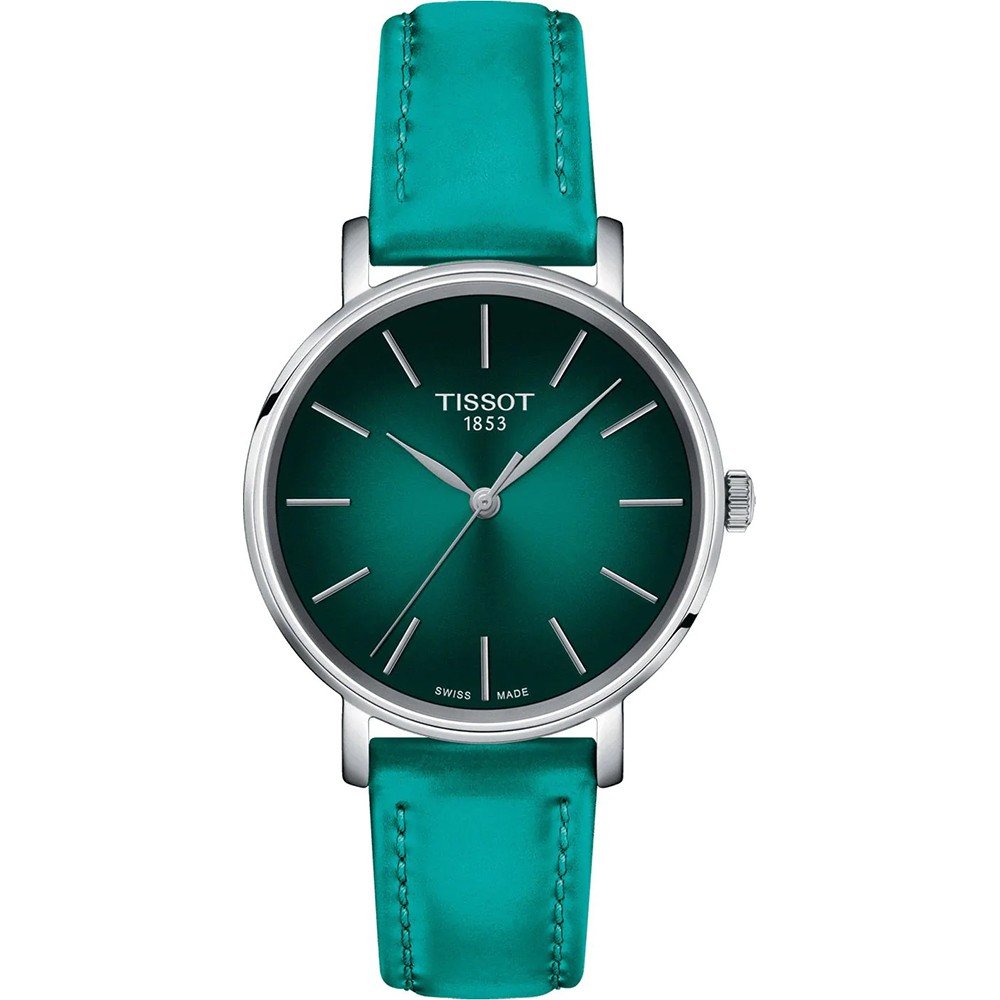 Orologio Tissot Everytime con cassa argentata, quadrante verde smeraldo e cinturino in pelle turchese.