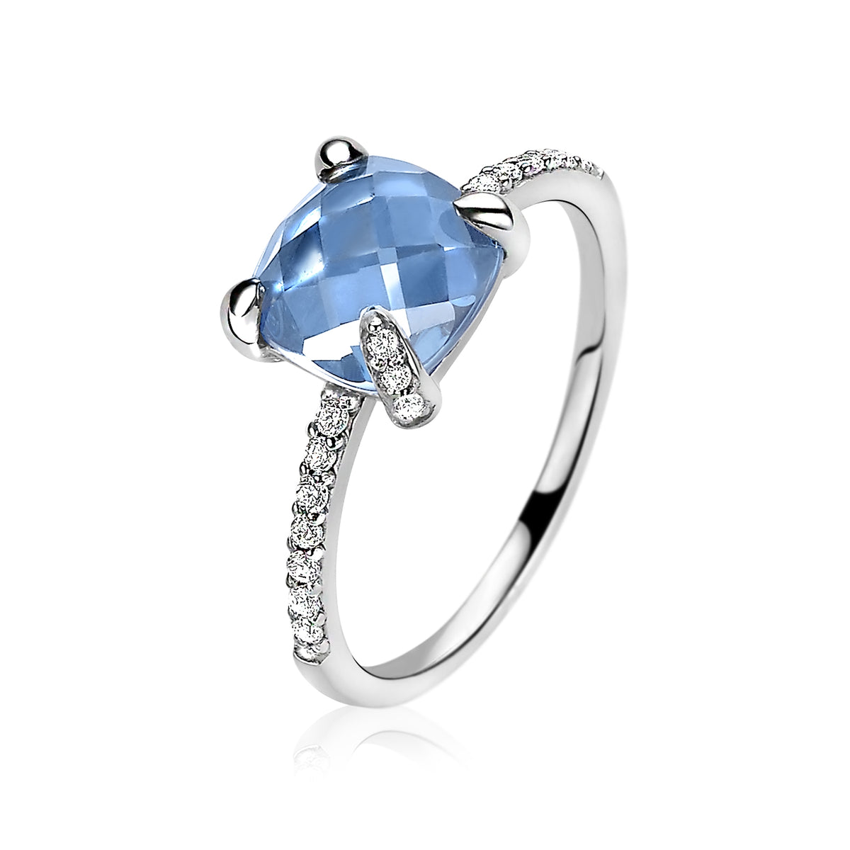 Anello in argento con pietra blu sfaccettata e dettagli in zirconia.