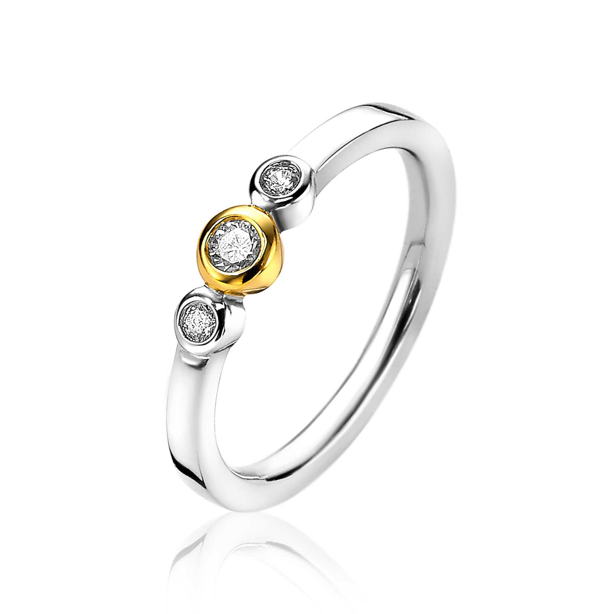 Anello in argento con dettagli dorati e tre zirconi.